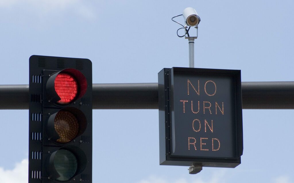 red light camera on traffic signal